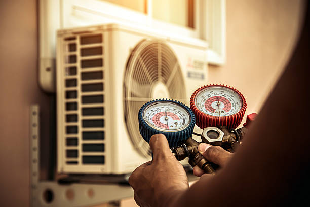 Professional Hvac technician working in West Olive, MI